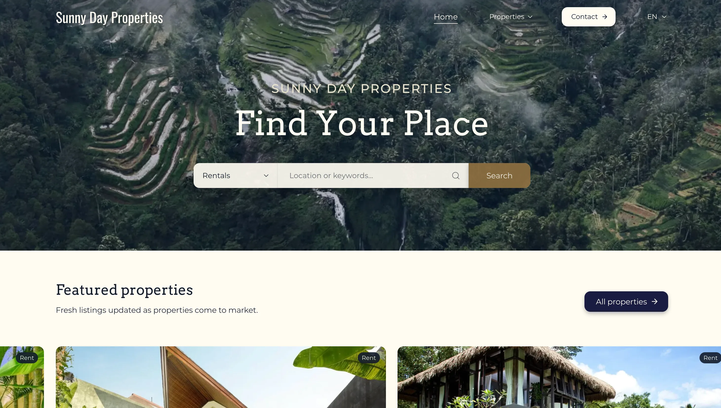 Sunny Day Properties homepage hero with a rice terrace landscape and Rentals search bar